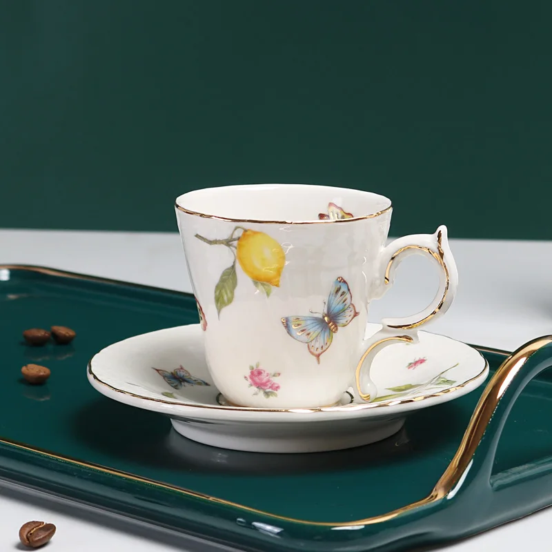 Европейският керамични набор от кафе чаши и блюдец с лимонена папийонка и лъжици, британски следобеден чай с малък капацитет 100 мл