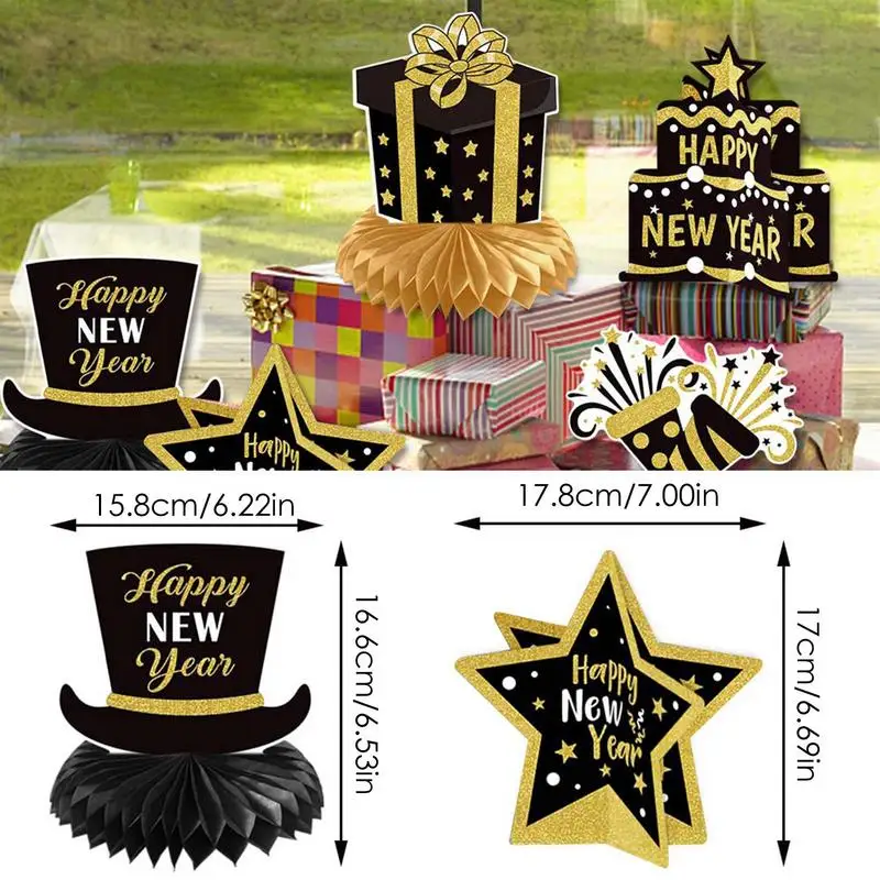 Централните елементи под формата на сот честита Нова година, черни и златни клетки, в цилиндър за маса, хартия вентилатора, балони, украса, украса за Нова година